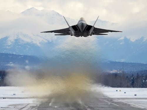 An Air Force F-22 Raptor assigned to the 3rd Wing flies over Joint Base Elmendorf-Richardson, Alaska, Feb. 27, 2018. The F-22 Raptor is the U.S. Air Force’s premium fifth-generation fighter asset. (Photo by Jamal Wilson)