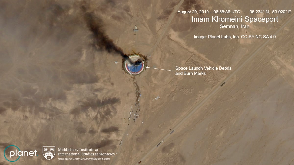 Satellite photos show burning Iran space center launch pad