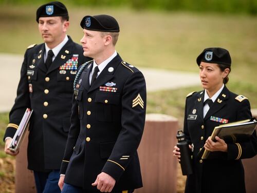 Army Sgt. Bowe Bergdahl, center, arrives at the Fort Bragg courtroom facility for an arraignment hearing on Tuesday, May 17, 2016. (Andrew Craft/The Fayetteville Observer via AP)