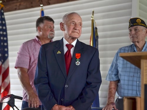 WWII veteran Jimmie H. Royer attends the ceremony where he was awarded France's Legion of Honor at VFW Post 346 in Terre Haute, Ind., Sunday, Sept. 29, 2019. (Austen Leake/The Tribune-Star via AP)