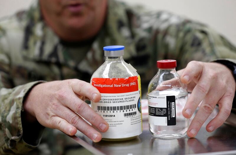 In this Wednesday, Nov. 8, 2017, photo, Army Col. Shawn Kane displays the components of freeze-dried plasma at Fort Bragg, N.C. (Gerry Broome/AP)