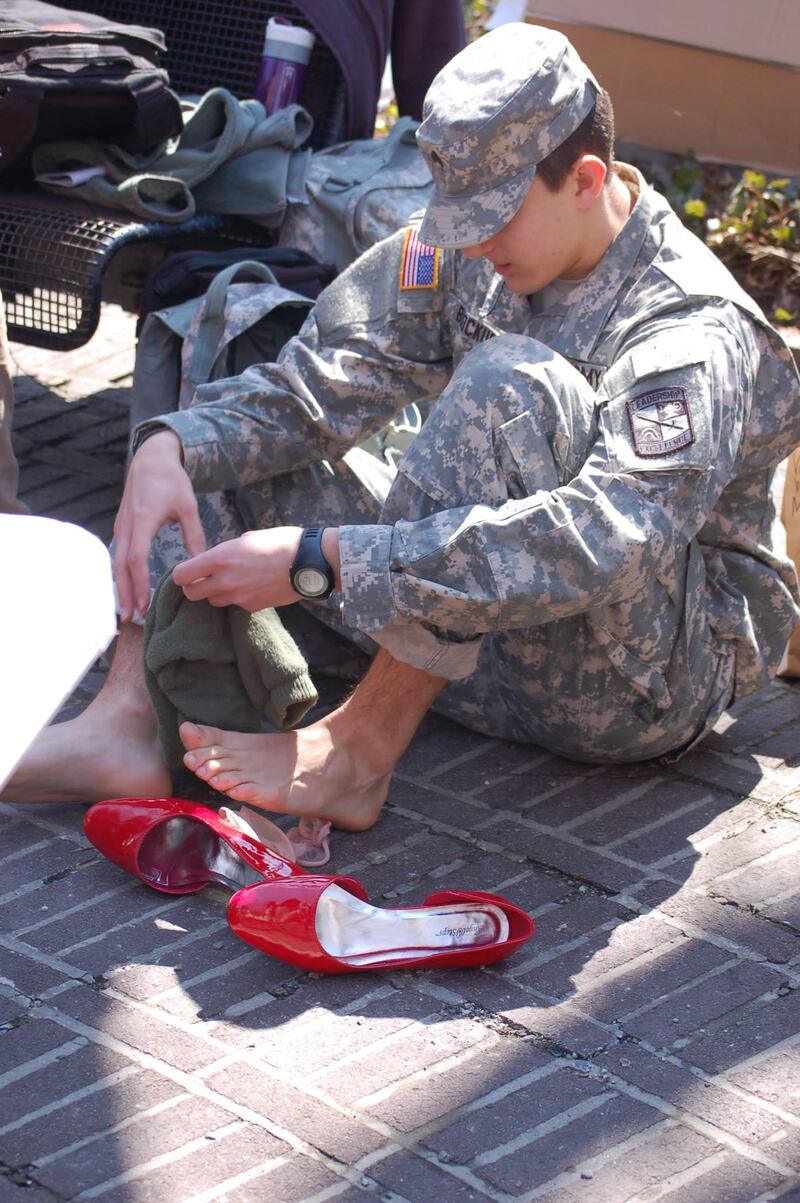 Cadets and cadre put on their favorite pair of high heels and marched in Temple's Walk a Mile in Her Shoes event to raise awareness of sexual assault against women. #TUWAM15 Temple University ROTC