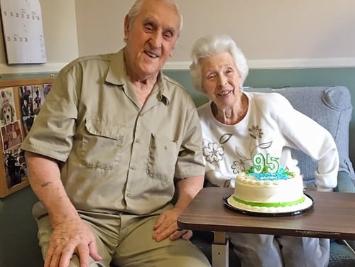 Former Navy Quartermaster 1st Class George Mendonsa and his wife of 71 years, Rita, celebrate George’s 95th birthday. (photo by Hal Burke)
