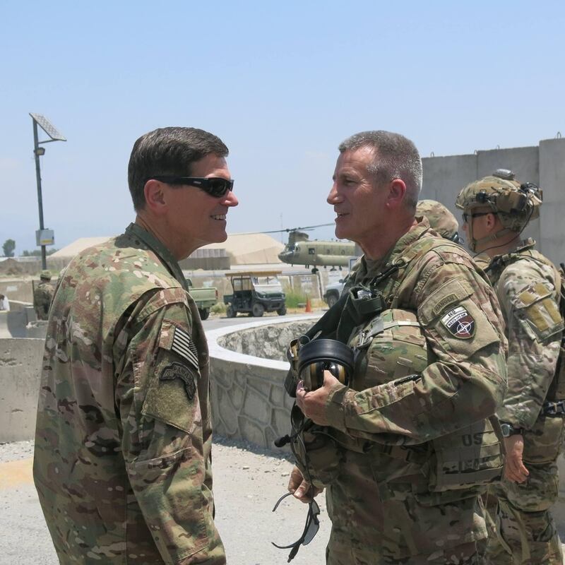 Now-retired Army Gen. Joseph Votel (left), at the time CENTCOM commander, talks with now-retired Army Gen. John Nicholson, at the time commander of U.S. forces in Afghanistan, at FOB Fenty in Jalalabad. (Howard Altman/Tampa Bay Times)