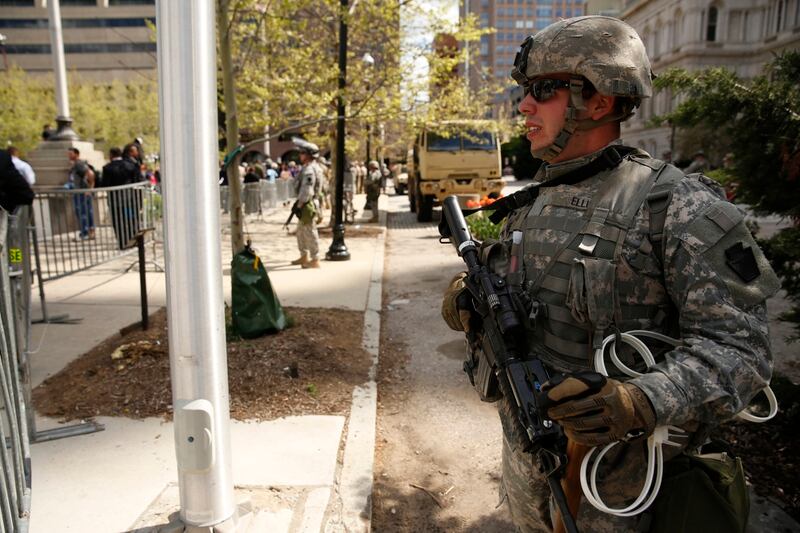 Pvt. Matthew Ellis of A Company, 1-175th Infantry, Maryland National Guard, stands post in front of City Hall in Baltimore, Md., on Tuesday, April 28, 2015. Maryland governor Larry Hogan activated the Guard after rioting in the wake of the funeral of Freddie Gray who died in police custody. (Mike Morones/Army Times)