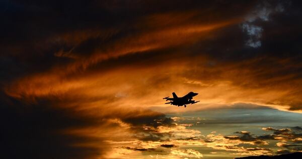 An F-16 Fighting Falcon with the 555th Fighter Squadron flies at sunset. The Triple Nickel's deployment to Al Udeid Air Base in Qatar is meant to send a message to Iran. (Staff Sgt. Krystal Ardrey/Air Force)