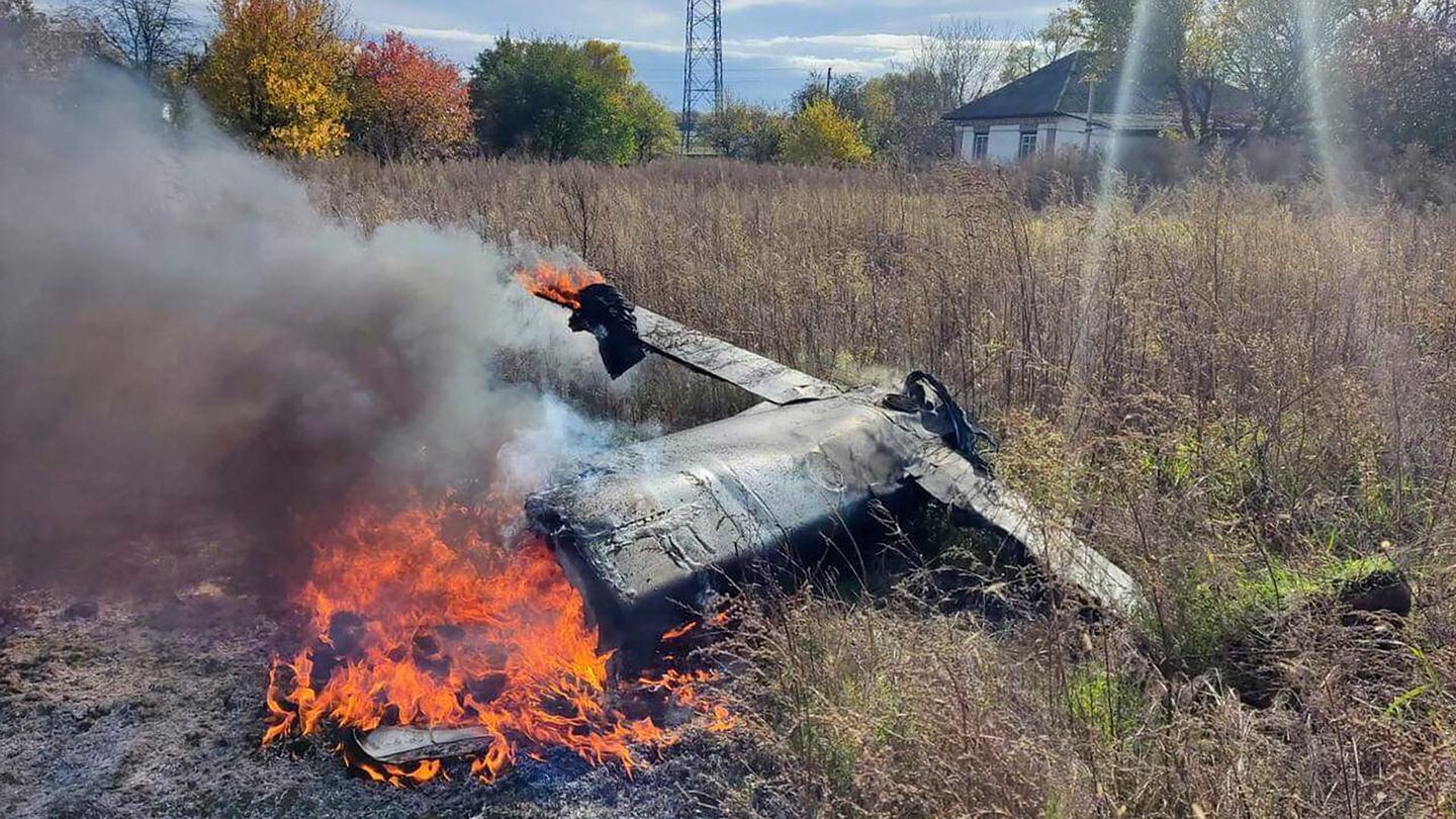 Fragments of a Russian rocket that was shot down by a Ukrainian air defense system burn in the village of Kipti in Ukraine's Chernihiv region on Oct. 19, 2022. (Ukrainian Defence Ministry Press Service via AP)
