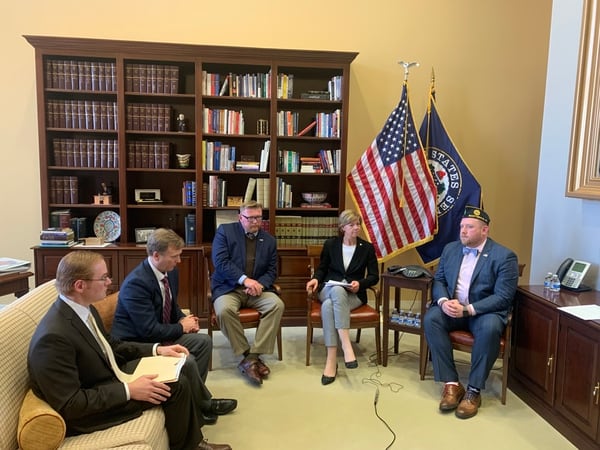 Supporters of the HAVEN Act meet in the office of Sen. Tammy Baldwin, D-Wis., to discuss the new legislation. From L to R: John Hartgen, the American Bankruptcy Institute's public affairs manager; John Thompson, a bankruptcy lawyer with the ABI; Shane Liermann, Disabled American Veterans' national legislative director; Sen. Baldwin; and Matthew Shuman, the American Legion's national legislative director (Photo courtesy of the Office of Sen. Tammy Baldwin)