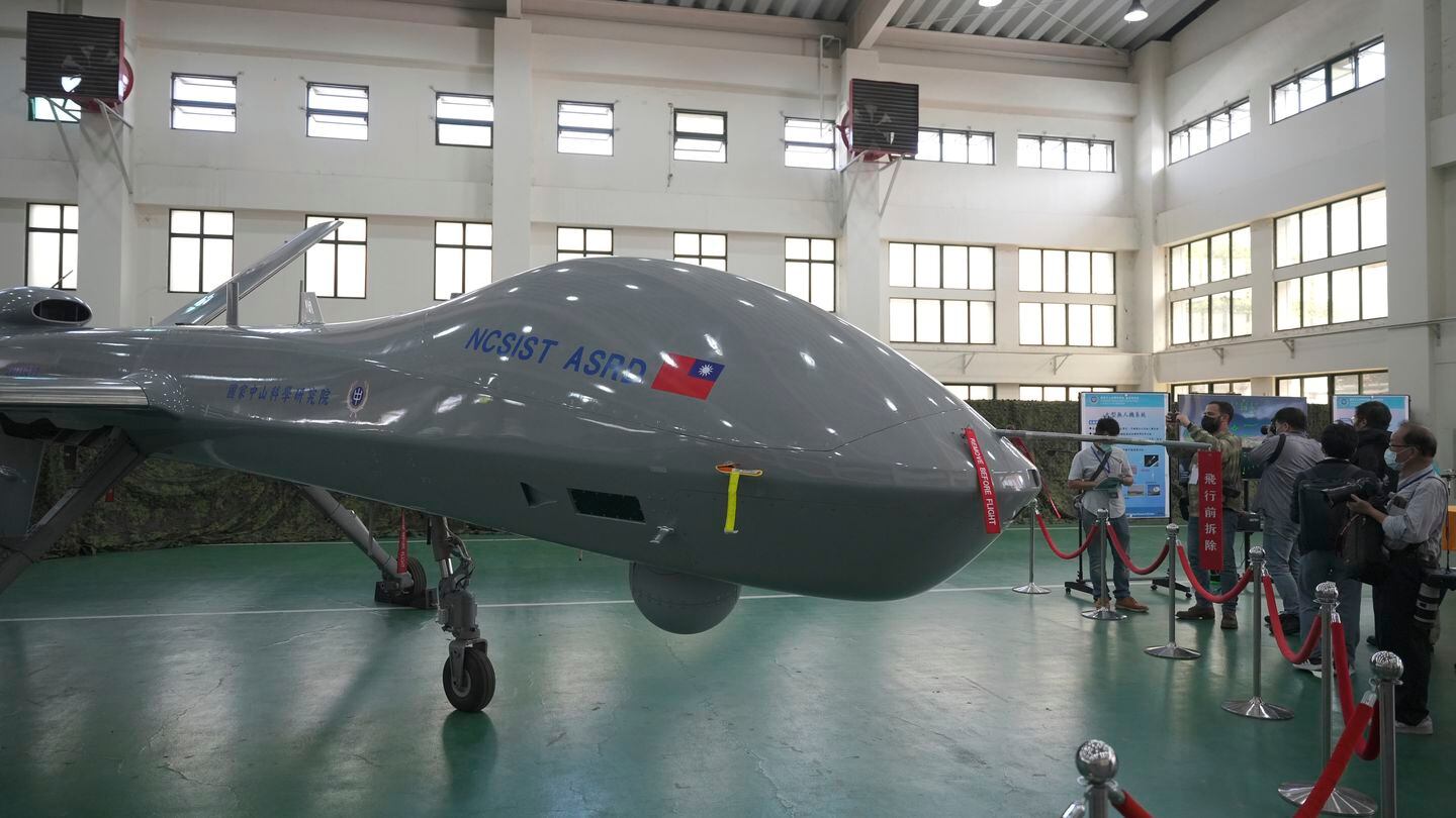 Members of the media look at the Taiwanese developed large UAV Teng Yun, which resembles the American MQ-9 Reaper and can stay aloft for up to 24 hours, at the National Chung-Shan Institute of Science and Technology in Taichung in central Taiwan on Nov. 15, 2022. (Walid Berrazeg/AP)