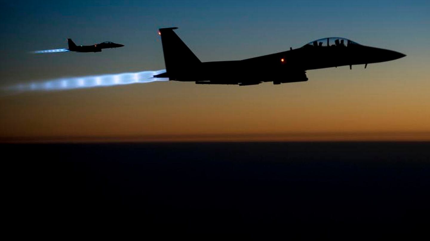 Two U.S. Air Force F-15E Strike Eagle aircraft fly over northern Iraq Sept. 23, 2014, after conducting airstrikes in Syria. (Senior Airman Matthew Bruch/Air Force)
