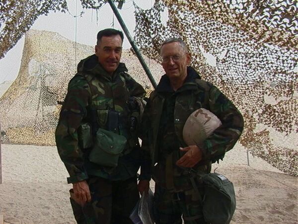 US Marine Corps (USMC) Colonel (COL) Joseph F. Dunford Jr. (left), Commanding Officer, 5th Marines, 1st Marine Division (MARDIV), Camp Pendleton California (CA), and USMC Major General (MGEN) James N. Mattis, Commanding General, 1st Marine Division (MARDIV) stop for a portrait prior to crossing the Line of Departure (LOL). The LOL is an imaginary line to coordinate the beginning of the attack when they carry out the battle plan for war with Iraq during Operation IRAQI FREEDOM.