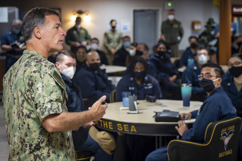 Adm. John Aquilino, commander of U.S. Pacific Fleet, speaks with sailors assigned to the USS Carl Vinson (CVN 70) on Feb. 8, 2021.