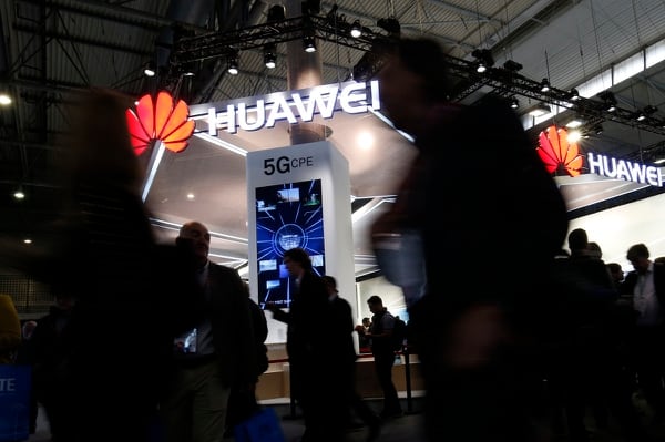 U.S. President Trump blocked Broadcom Limited — a Singapore-based company tied to Chinese firm Huawei Technologies Co. — from acquiring Qualcomm Inc. Huawei and Qualcomm are the two dominant players in the market for next-generation wireless 5G. (Pau Barrena/AFP via Getty Images)