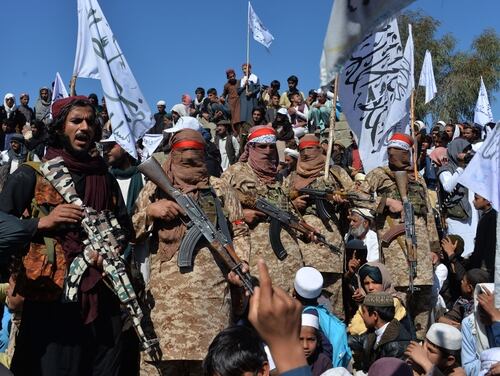 Afghan Taliban militants and villagers attend a gathering as they celebrate the peace deal in Afghanistan's Alingar district of Laghman Province on March 2, 2020. (Noorullah Shirzada/AFP via Getty Images)
