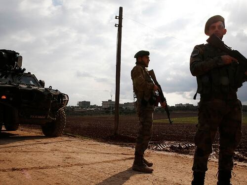 Turkey-backed opposition fighters of the Free Syrian Army secure a checkpoint at the village of Maarin, in the outskirts of the northwestern city of Azaz, Syria, Saturday, Jan. 27, 2018. (Lefteris Pitarakis/AP)