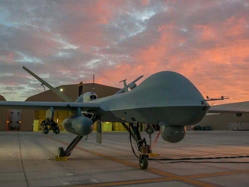 An MQ-9 Reaper equipped with an extended range modification from the 62nd Expeditionary Reconnaissance Squadron sits on the ramp at Kandahar Airfield, Afghanistan, Dec. 6, 2015. (Tech. Sgt. Robert Cloys/Air Force)