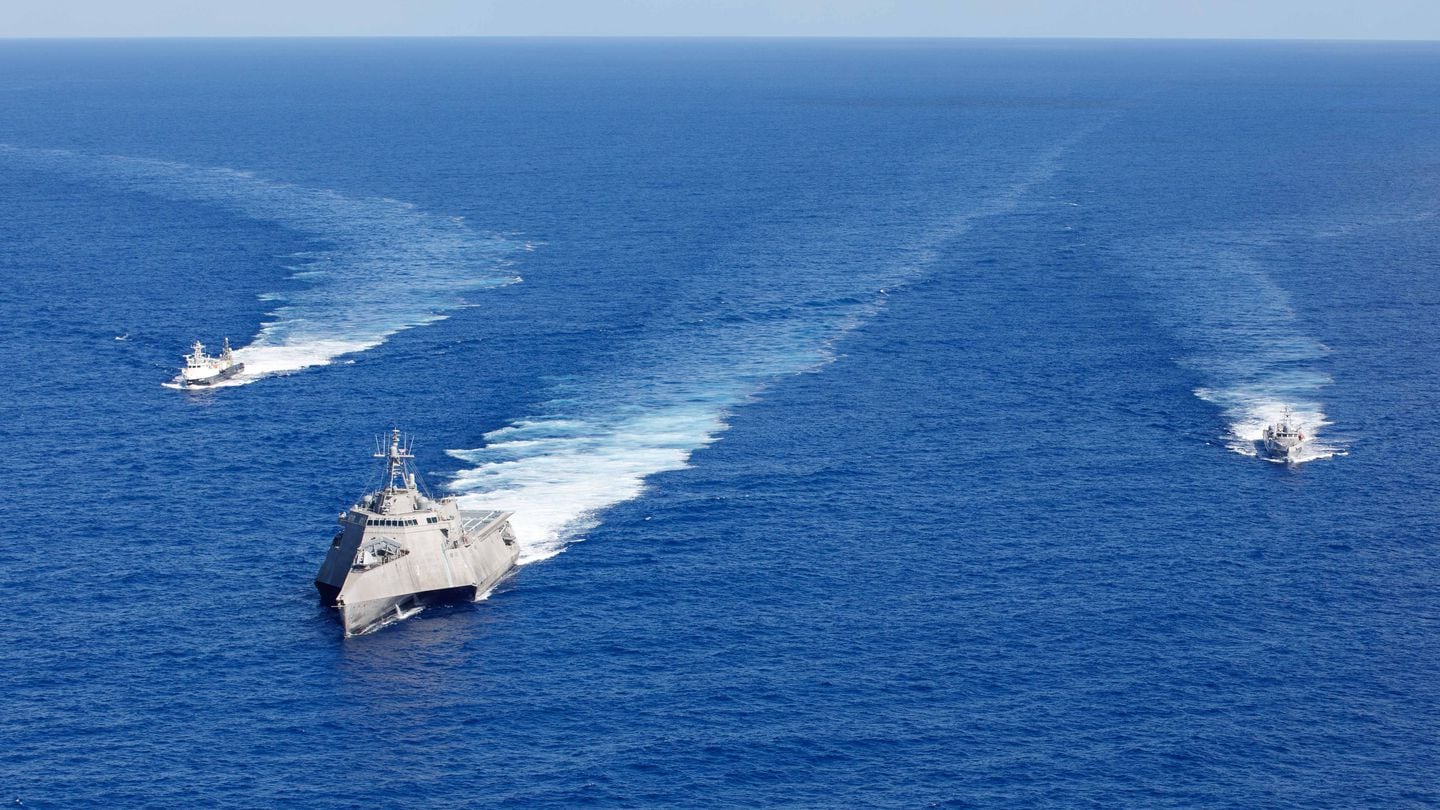 The Independence-variant littoral combat ship USS Gabrielle Giffords (LCS 10) leads the formation in a photo exercise with the unmanned surface vessels Ranger and the USV Mariner during Integrated Battle Problem (IBP) 23.2, Sep. 7, 2023.  (MC2 Jesse Monford/US Navy)