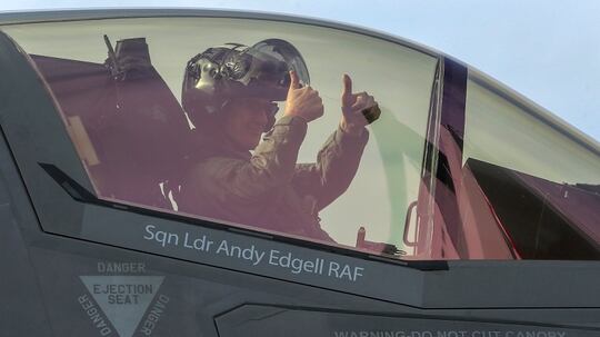 RAF Squadron Leader Andy Edgell sits in the cockpit of a new F35B Lightning fighter jet as he prepares to take off from the HMS Queen Elizabeth as it sails at sea in the Atlantic Ocean off the U.S. mid-Atlantic coast, on September 27, 2018. The carrier is currently participating in flight trials with two new F35-B's and eventually be able to embark up to 24 of the supersonic jets. (Photo by Mark Wilson/Getty Images)