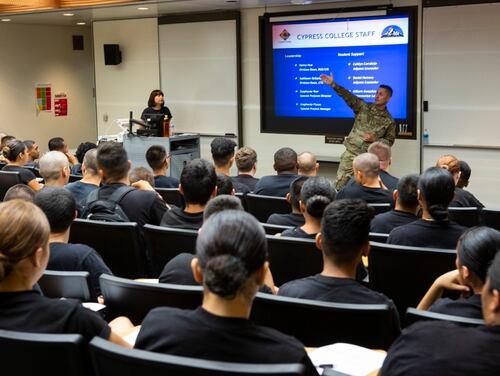 Visiting scholars receive a briefing during their visit to Cypress College in California on Aug. 7, 2019, as part of a California National Guard program. (Staff Sgt. Crystal Housman/Air National Guard)