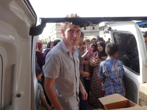 This undated photo provided by the Kassig Family shows Peter Kassig, a former U.S. Army Ranger, delivering supplies for Syrian refugees (Kassig Family/Facebook)