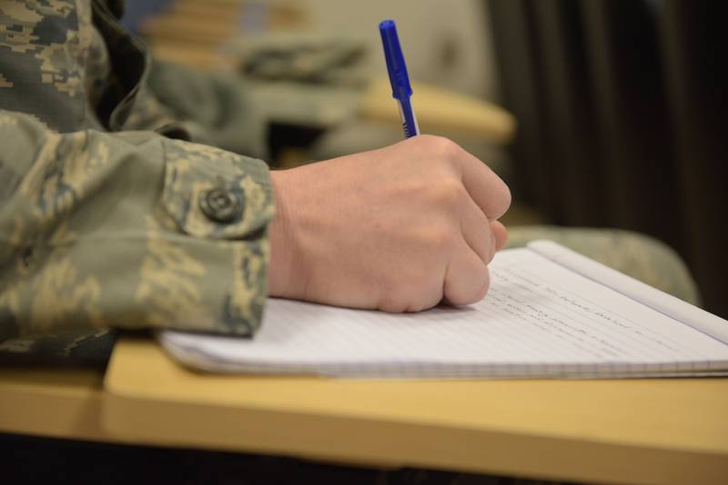 Staff Sgt. Matthew Shannon, of the individual personnel readiness office with the 911th Force Support Squadron, takes notes during an enlisted performance report bullet writing seminar at the Pittsburgh International Airport Air Reserve Station, April 8, 2018. The EPR bullet writing seminar was conducted by Chief Master Sgt. Chin Cox, the Office of the Joint Staff Surgeon Senior Enlisted Leader at the Pentagon, to improve airmen's writing skills. (Airman 1st Class Grace Thomson/Air Force)