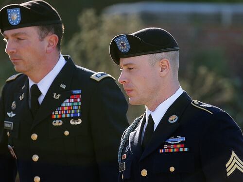 Army Sgt. Bowe Bergdahl, right, arrives for a pretrial hearing at Fort Bragg, N.C., with his defense counsel Lt. Col. Franklin D. Rosenblatt, left, on Tuesday, Jan. 12, 2016. (AP Photo/Ted Richardson)