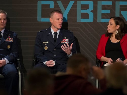 Brig. Gen. Timothy Haugh, left, Director of Intelligence, U.S. Cyber Command at Fort Meade, MD, with Col. Todd Stratton, center, Director, AFCYBER Forward, in a panel on Fighting Terror in Cyberspace moderated by Amber Corrin, right, Sr. Reporter, C4ISRNet, during Cybercon 2017 at the Ritz-Carlton Hotel in Pentagon City on Nov. 28, 2017. (Alan Lessig/Staff)