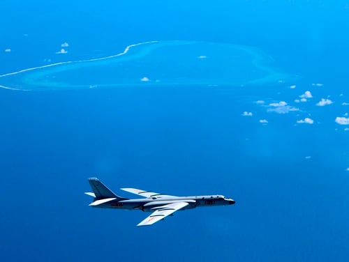 A Chinese H-6K bomber patrols the islands and reefs in the South China Sea in this undated photo. (Liu Rui/Xinhua via AP)