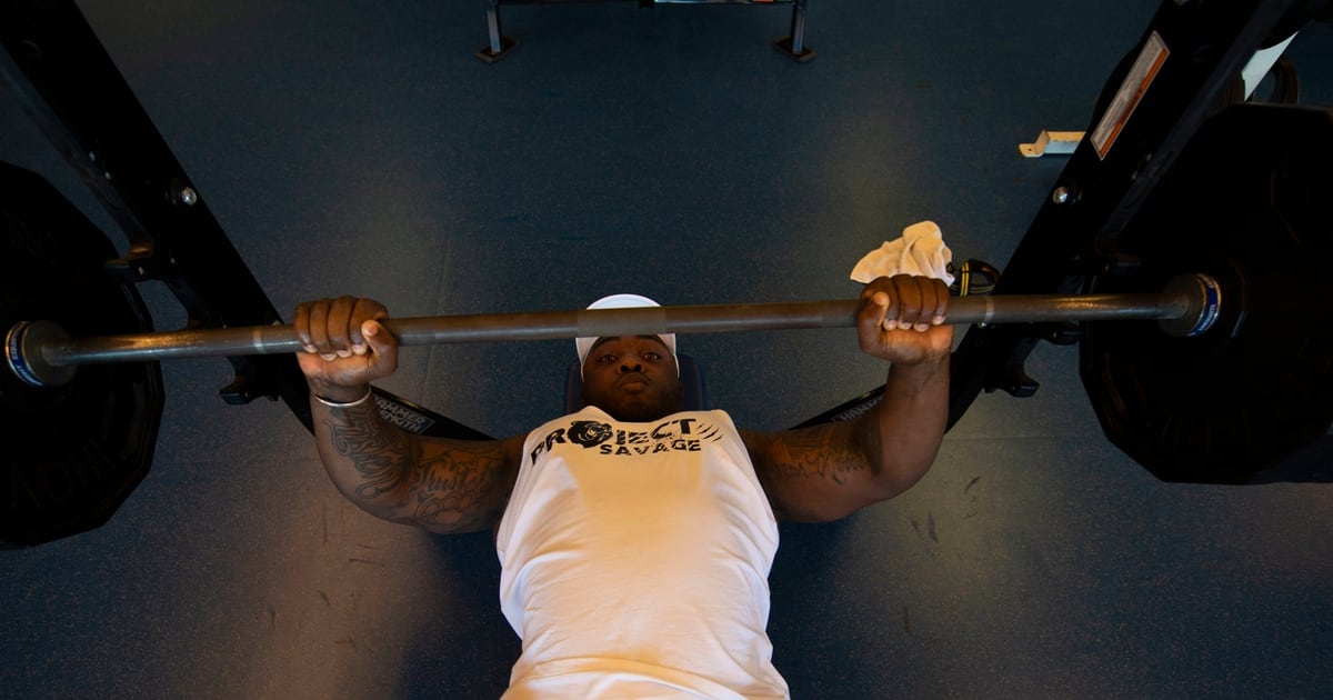 Bench Pressing An Engine Block Weightlifting Airman Smashes World