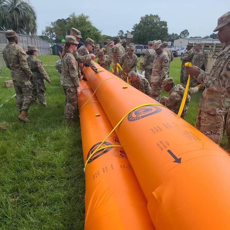 Florida National Guard Soldiers with the 146th Expeditionary Signal Battalion completed training on the Tiger Dam system in preparation to respond to Hurricane Ian on Sept. 28, 2022. This system is a water filled bladder capable of diverting flood waters within minutes.