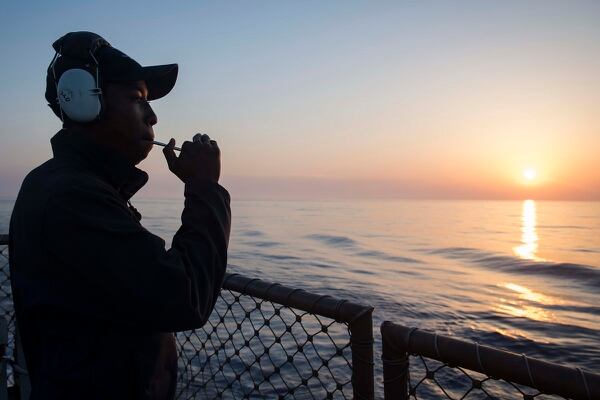 Boatswain's Mate Seaman Apprentice Shaun Smith practices with the boatswain's pipe aboard the destroyer Donald Cook. (U.S. Navy photo by MC2 Alyssa Weeks)