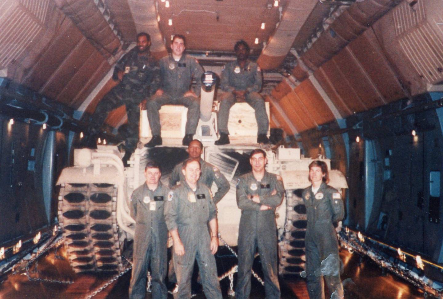 Maj. Stephanie Wells with her crew on a C-5 during Desert Shield/Desert Storm.