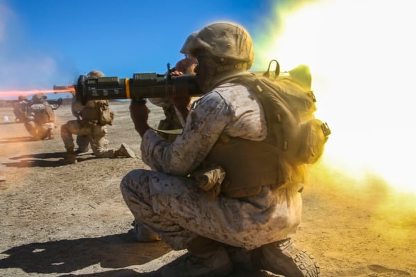 Marines with Ammo Company, Combat Logistics Battalion 15, 1st Marine Logistics Group (1st MLG) are instructed in the proper handling of the M136E1 AT4-CS confined space light anti-armor weapon in 2014. (Lance Cpl. Jordan E.Gilbert/Marine Corps)