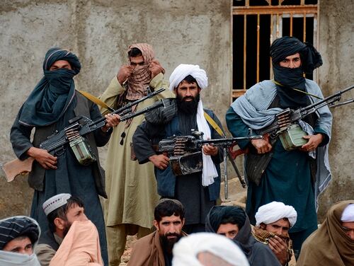 In this Nov. 3, 2015, file photo, Afghan Taliban fighters listen to Mullah Mohammed Rasool, the newly elected leader of a breakaway faction of the Taliban, in Farah province, Afghanistan. (AP)