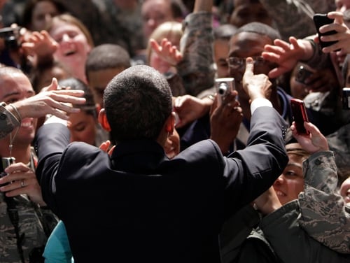 President Barack Obama greets members of the U.S. military during a rally with troops at Elmendorf Air Force Base in Anchorage, Alaska, Thursday, Nov. 12, 2009. (AP Photo/Pablo Martinez Monsivais)