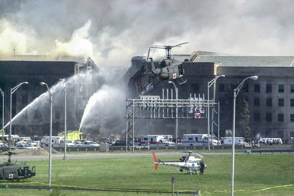 A Red Cross Army helicopter lands in front of the collision site at the Pentagon after the 9/11 attacks. (Army)