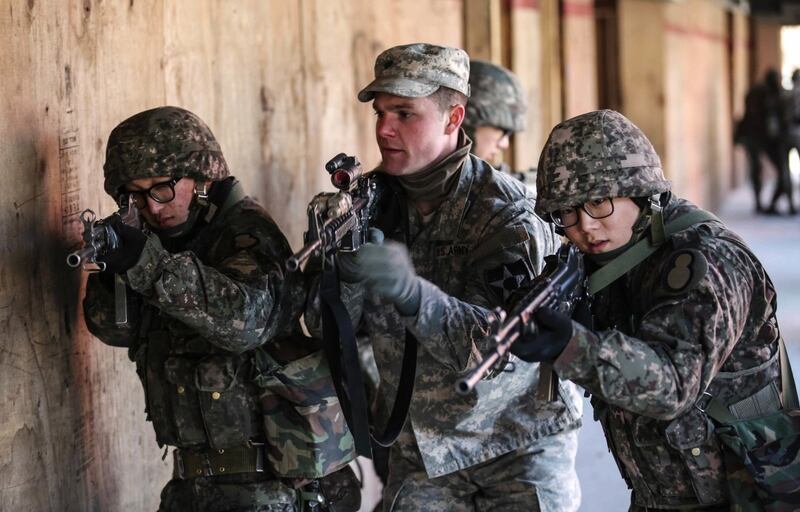 U.S. soldiers and Republic of Korea soldiers conduct an urban breaching at Rodriguez Live Fire Range, South Korea, March 9, 2016. (Staff. Sgt Kwadwo Frimpong/Army)
