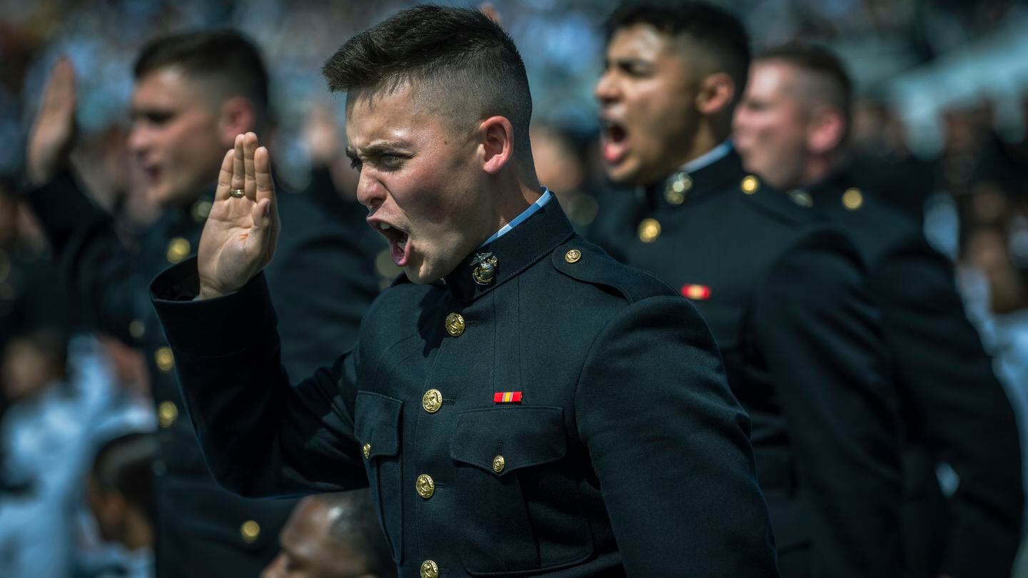 Newly commissioned U.S. Marine Corps second lieutenants take the oath of office during the U.S. Naval Academy's Class of 2023 graduation ceremony. (Chad J. McNeeley/DoD)