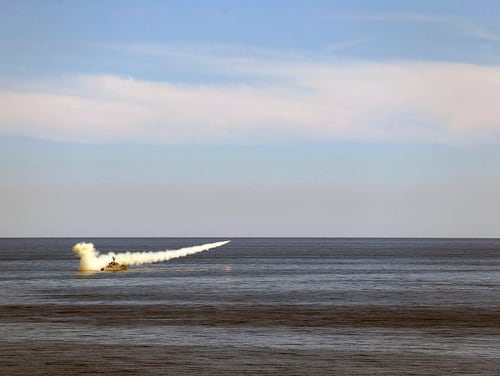 In this image released Thursday, Jan. 14, 2021, by the Iranian Army, a missile is launched from a warship during a naval drill. (Iranian Army via AP)