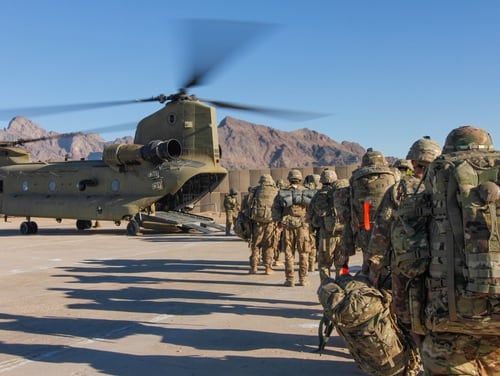 Soldiers attached to the 101st Resolute Support Sustainment Brigade load onto a Chinook helicopter in Afghanistan. (1st Lt. Verniccia Ford/Army)