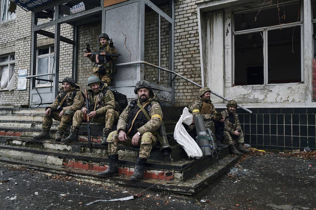 Ukrainian soldiers rest near their position in Bakhmut, Donetsk region, Ukraine, Saturday, Dec. 17, 2022.