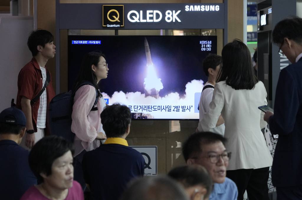 A TV screen shows an image of North Korea's missile launch during a news program at the Seoul Railway Station in Seoul, South Korea, Thursday, Aug. 31, 2023.