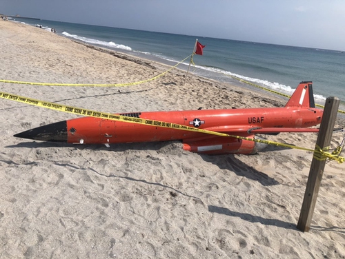 A U.S. Air Force BQM-167A aerial target drone washes ashore in Boynton Beach, Fla., on March 19, 2021. (Miranda Christian/WPTV)
