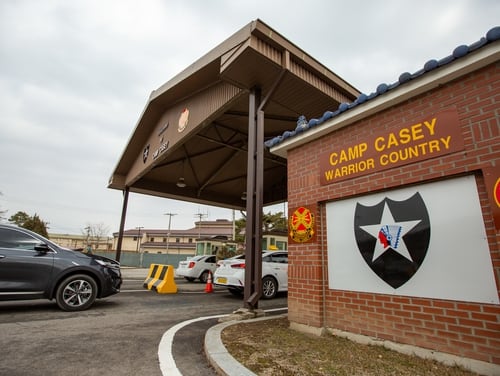 Soldiers stationed on U.S. Army Garrison Casey conduct pre-screening processes on individuals awaiting entry to the base, USAG-Casey, Dongducheon, Republic of Korea, Feb. 26, 2020. (Sgt. Amber I. Smith/Army)