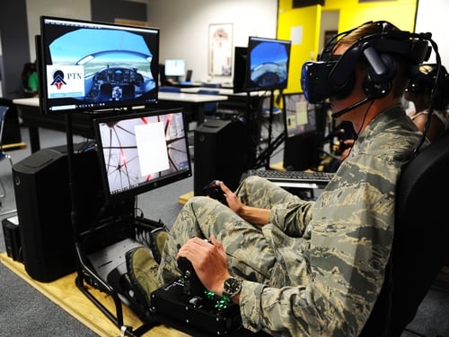 Cadet 1st Class Cade Cavanagh uses a virtual reality system to practice flying skills during a Pilot Training Next course in Summer 2019 at the Air Force Academy airfield. Capella Space's Synthetic Aperture Radar images could be used in future virtual reality scenarios. (Jennifer Spradlin/Air Force Academy)