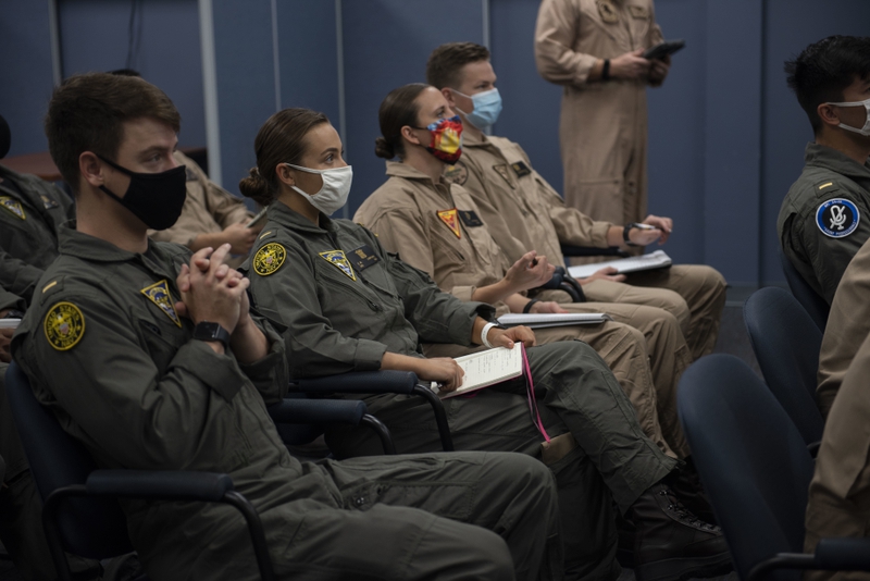 The first students enrolled in Naval Aviation Training Next-Project Avenger receive briefings from dedicated instructors. (Anne Owens/Navy)