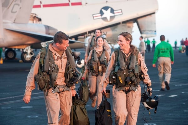 The Navy tapped Rear Adm. Sara Joyner, right, last year to lead a team that would focus on oxygen loss in the cockpits of several kinds of jets. But less than a year later, she is being transferred out, a move lawmaker fear could stymie progress on the physiological episodes issue. (Mass Communication Specialist Seaman Karl Anderson/Navy)