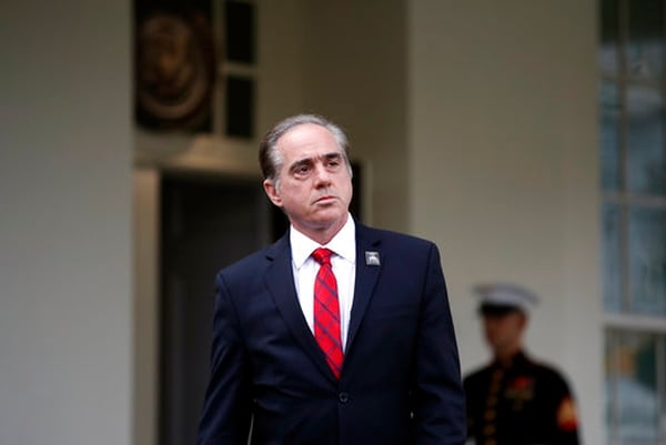 Veterans Affairs Secretary David Shulkin approaches to speak with the media at the White House on Nov. 1, 2017. A scathing inspector general's report this week blasted the secretary for multiple improprieties during an overseas trip last summer. (Alex Brandon/AP)