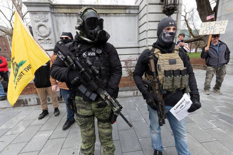 Members of the Boogaloo Movement attend a demonstration against a COVID-19 lockdown at the New Hampshire State House April 18, 2020, in Concord. (Michael Dwyer/AP)