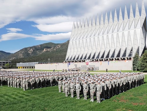 More than 1,300 basic cadets salute June 26 during their first reveille formation at the U.S. Air Force Academy in Colorado Springs, Colo. (Mike Kaplan/Air Force)
